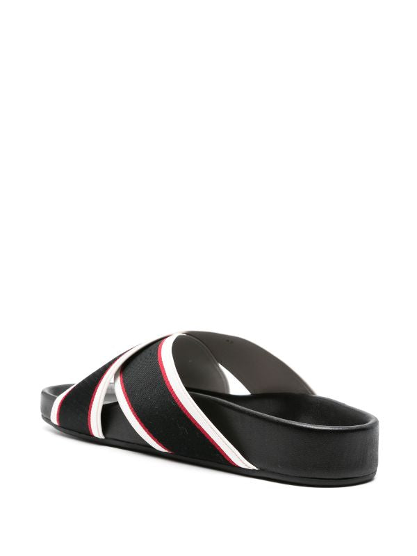 Christian Louboutin
Hot Cross Bizz striped slides