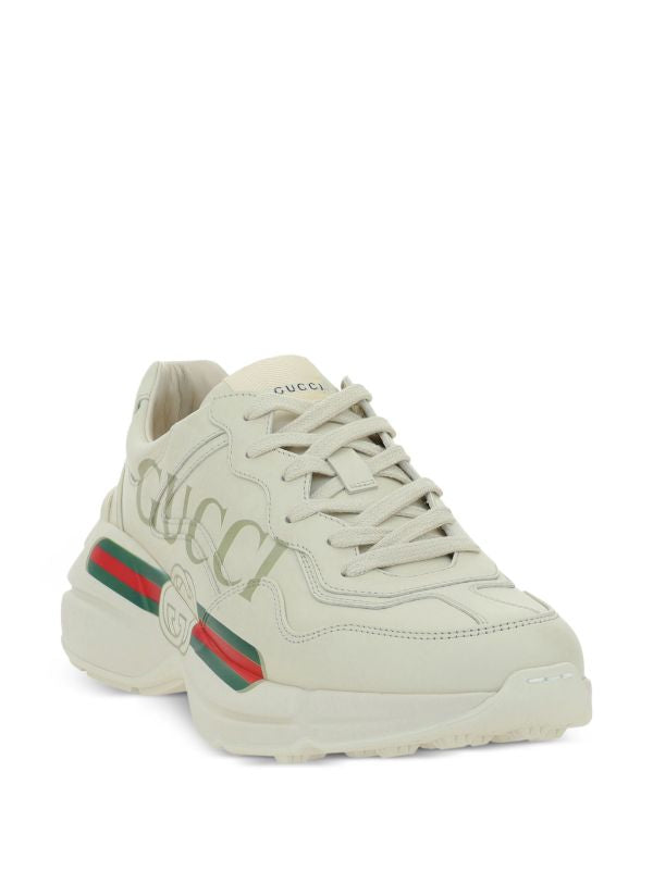 Gucci
Rhyton logo-print sneakers