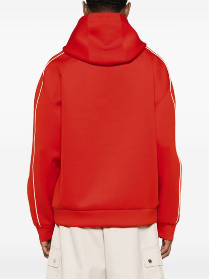 Gucci
logo-embossed pipped-trim hoodie